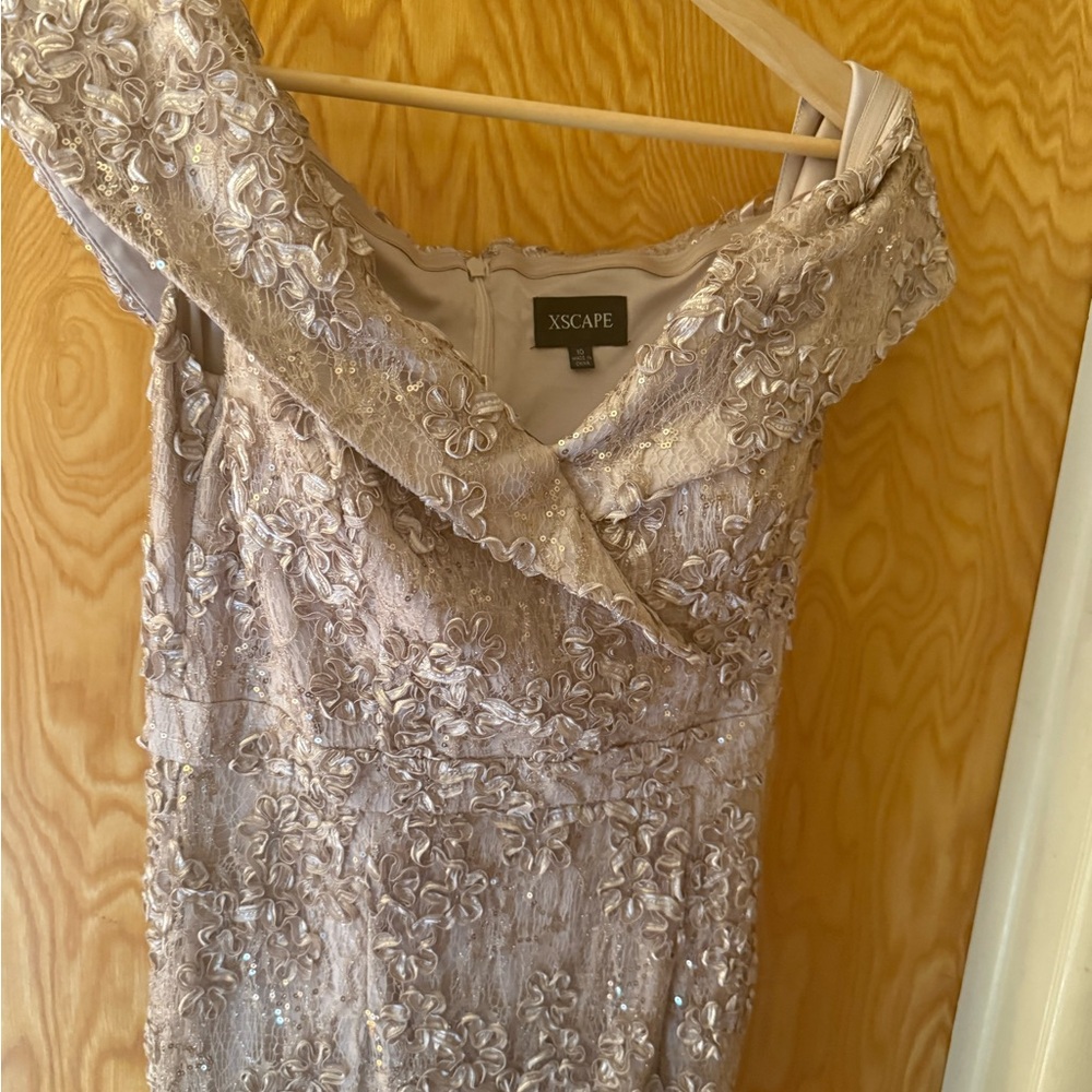 Xscape Beaded Floral Lace Off-Shoulder Gown in Light Champagne. Size 10